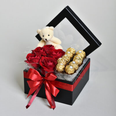 Elegant box arrangement with honey and chocolates